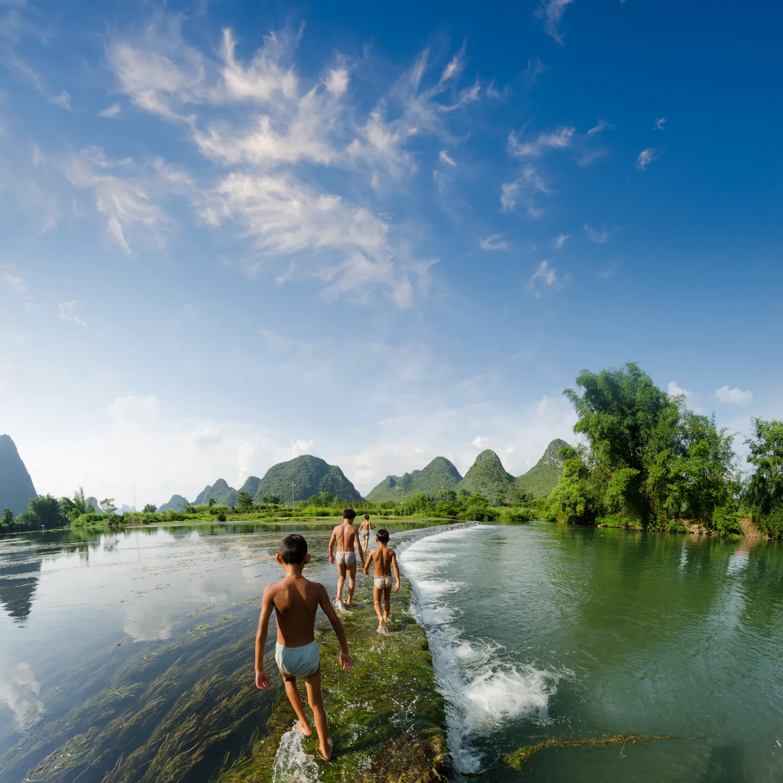 A weir across the river between Yangshuo’s hills