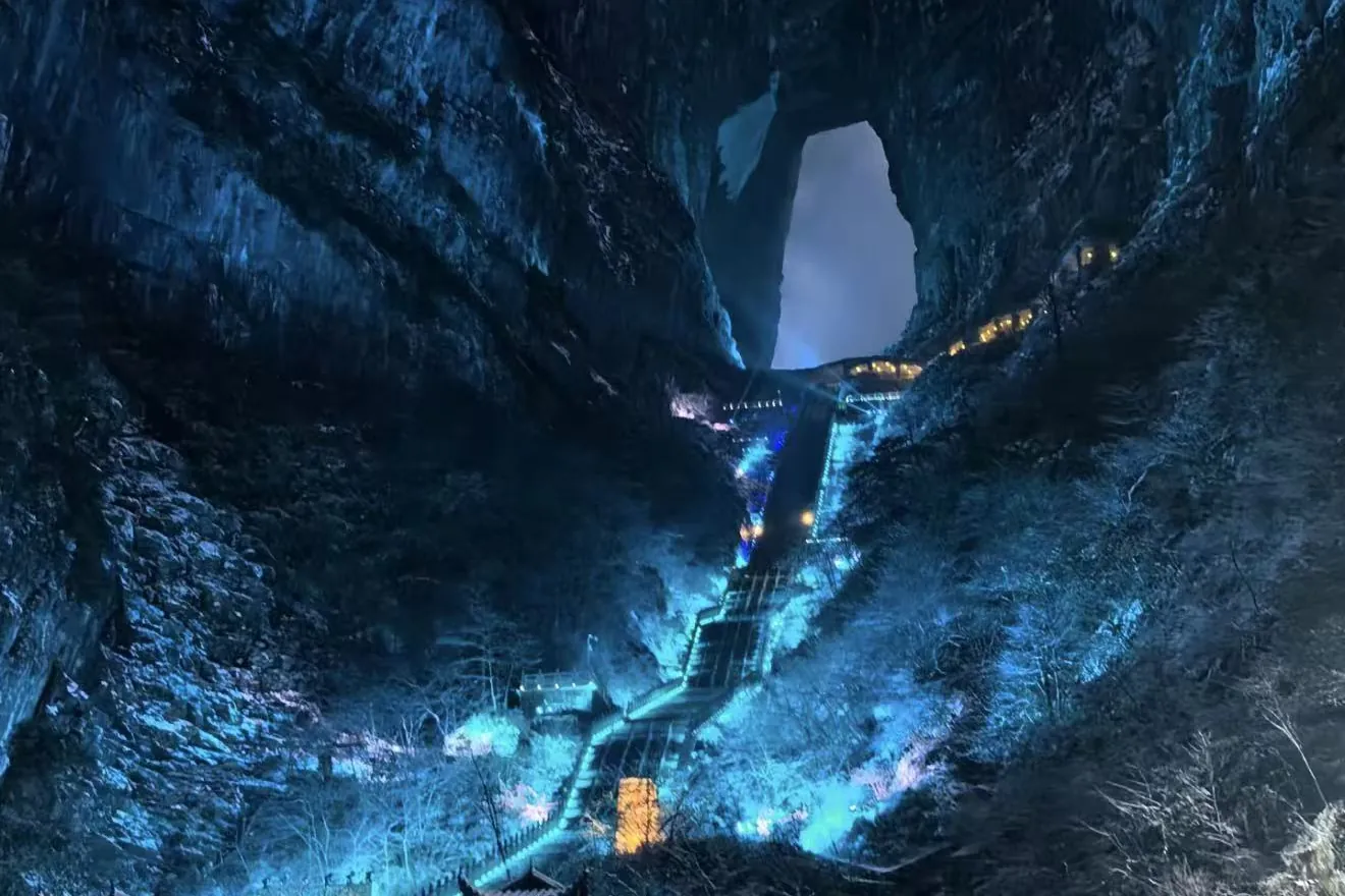 Tianmen Cave and its stairway lit up at night, Hunan