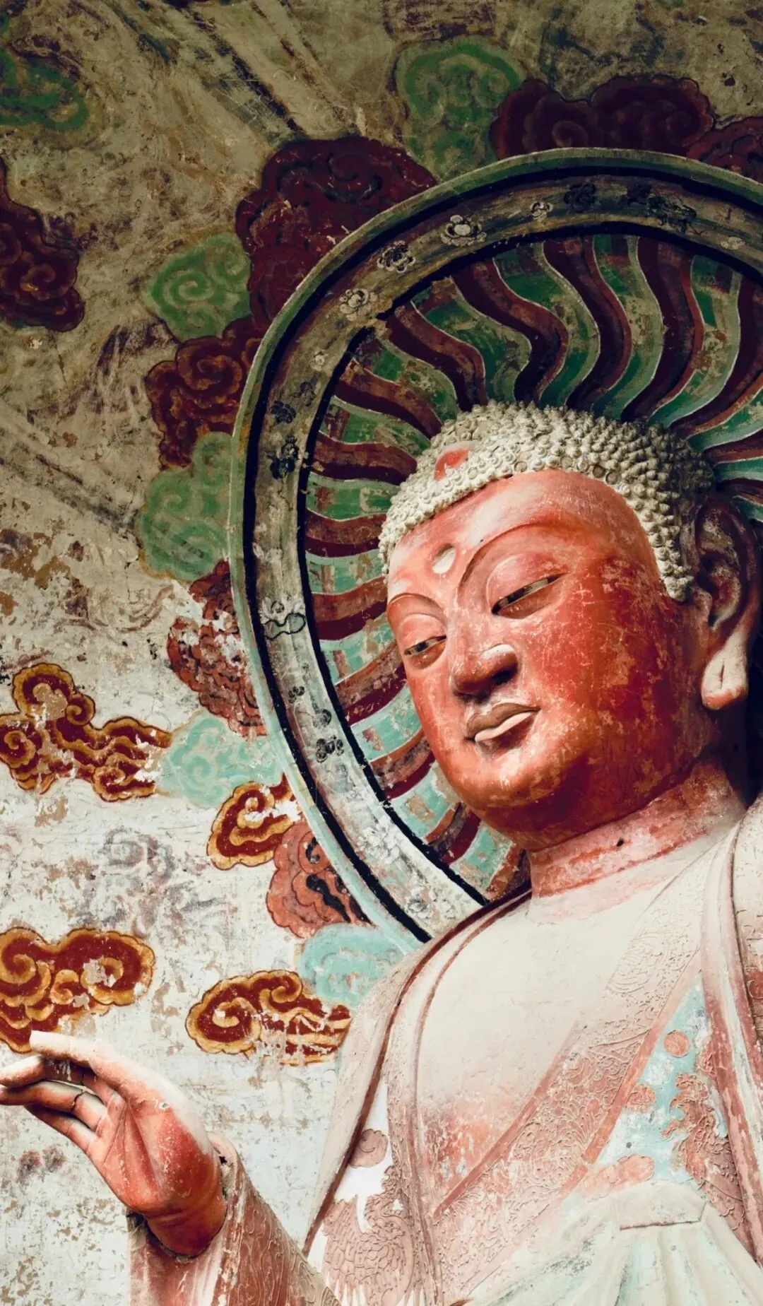 A Buddha in the Mogao Caves