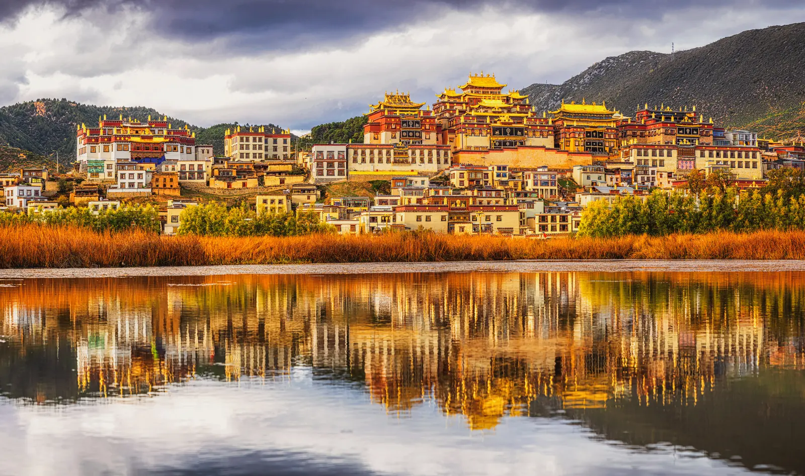 Songzanlin Monastery reflected in the lake, Shangri-La